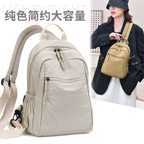 Cross-border super hot large capacity minimalist monochrome lightweight commuting travel backpack casual multi-functional chest bag crossbody bag