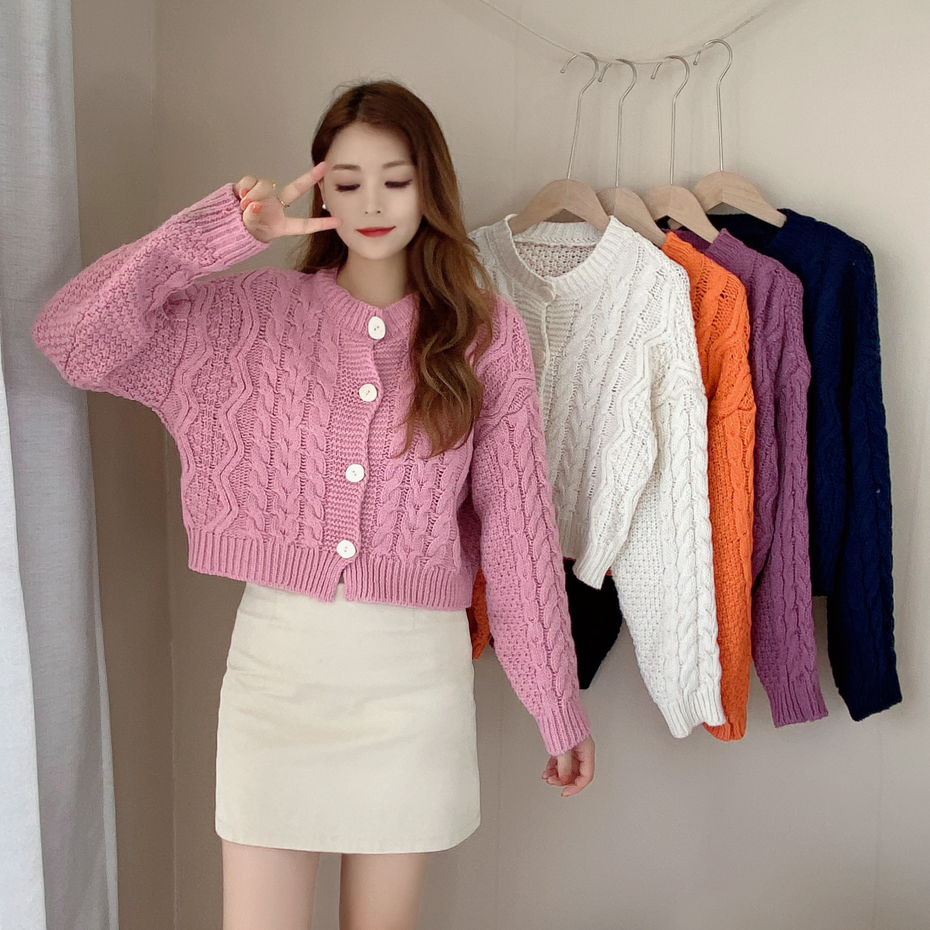 2021 spring Korean version lazy gentle style personalized design twist loose long sleeve knitted cardigan top women's fashion