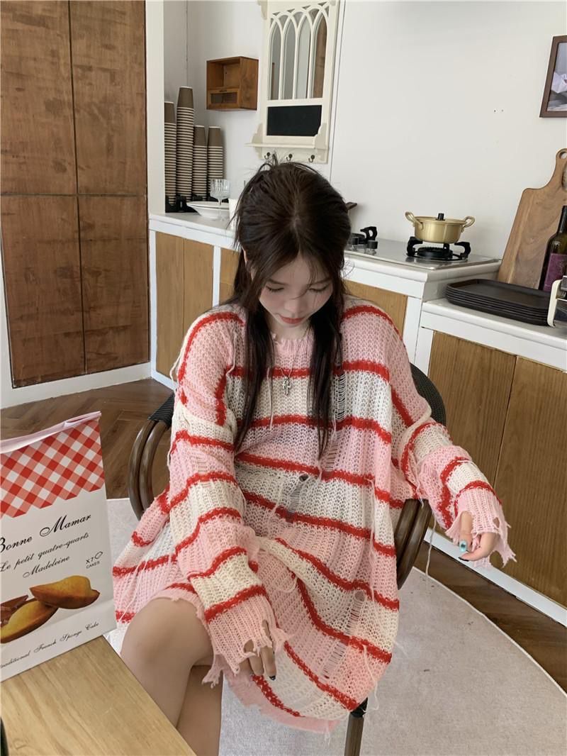 Real shooting real price early autumn new Korean sweet and lazy style hollow tassel striped knitted long-sleeved loose sweater