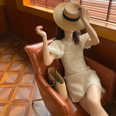 Design sense niche dress women's summer French round neck bubble sleeve waist show thin and light mature wind super fairy temperament skirt