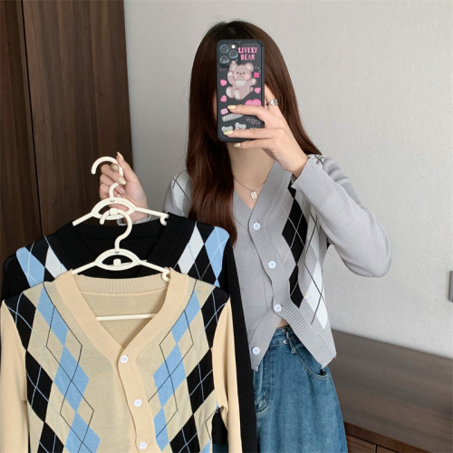 Real shooting real price autumn and winter new color contrast Lingge irregular design feeling loose and versatile knitted sweater cardigan top
