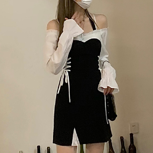 One shoulder dress women's 2021 early autumn new suspender design sense of waist closing and thin bandage hanging neck splicing skirt
