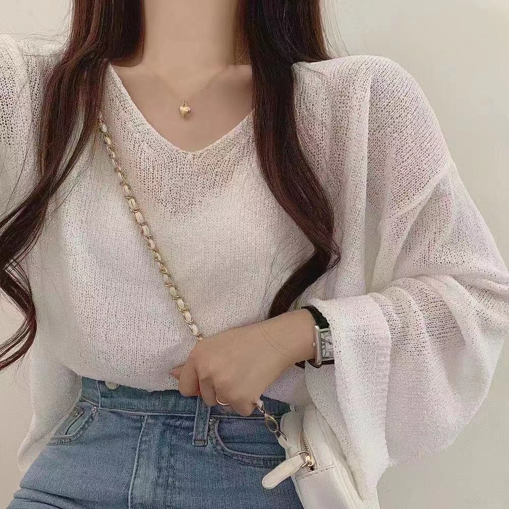 Ice silk knitwear women's summer hollow thin blouse sunscreen shirt design feeling open back long sleeve collar transparent top
