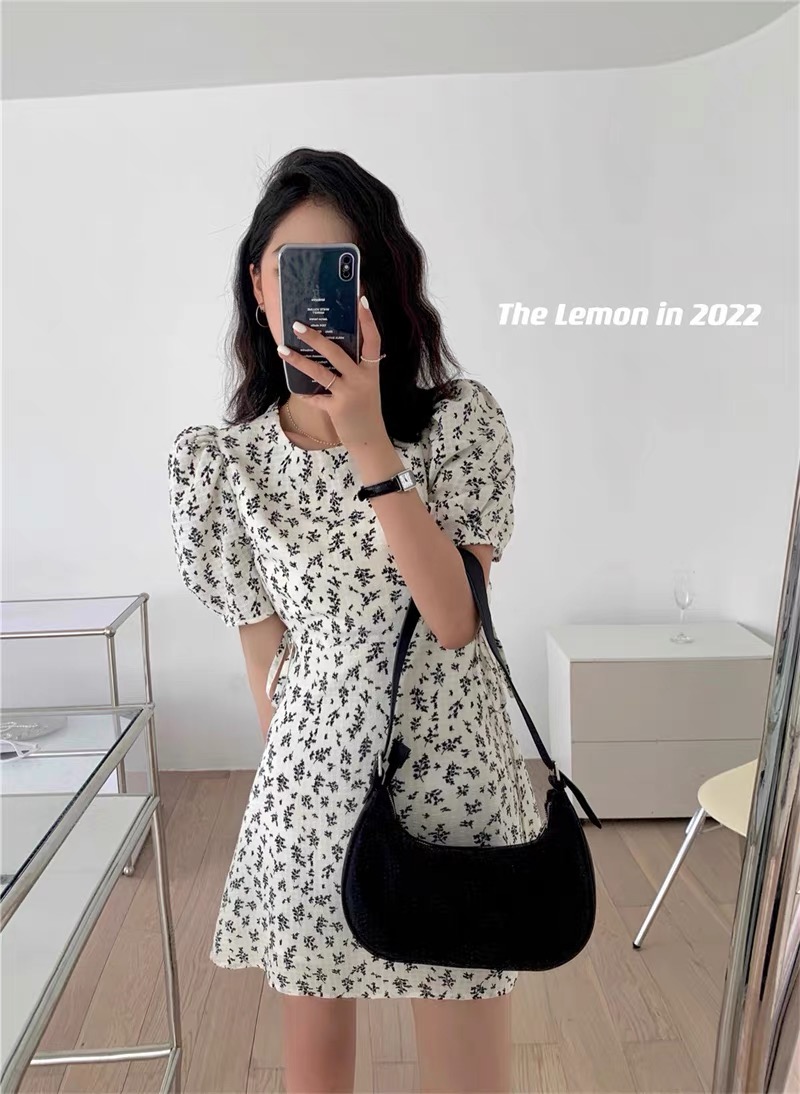 The lemon waist hollowed out A-shaped floral dress, minority design, summer round neck bubble sleeve short skirt, female
