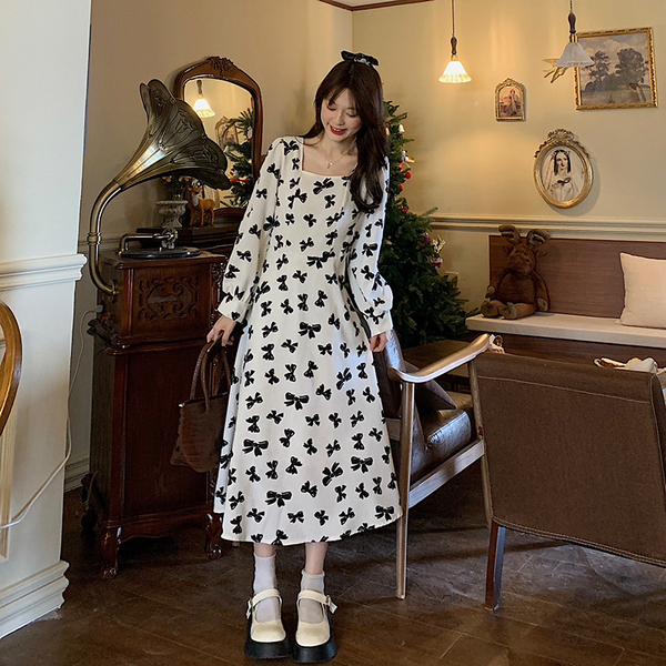 The real price of women's clothing is not transparent. Large women's clothing shows thin temperament at the waist. Long skirt broken flower long sleeve Jumpsuit