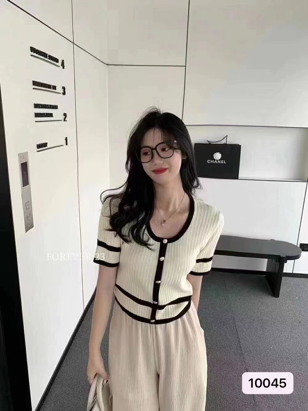 Xiaoxiangfeng knitwear high sense of gas and versatile short slim slim top women's thin summer 2022 new style