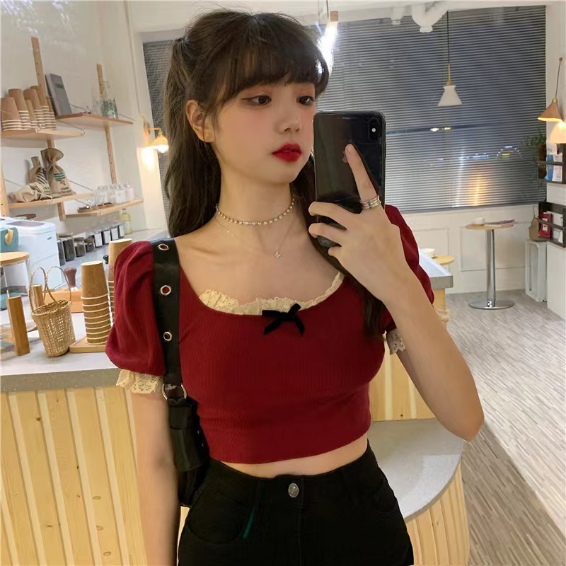 2022 summer Hong Kong Style Sexy High Waist exposed navel tight short sleeved T-shirt women's design sense niche close up gentle top