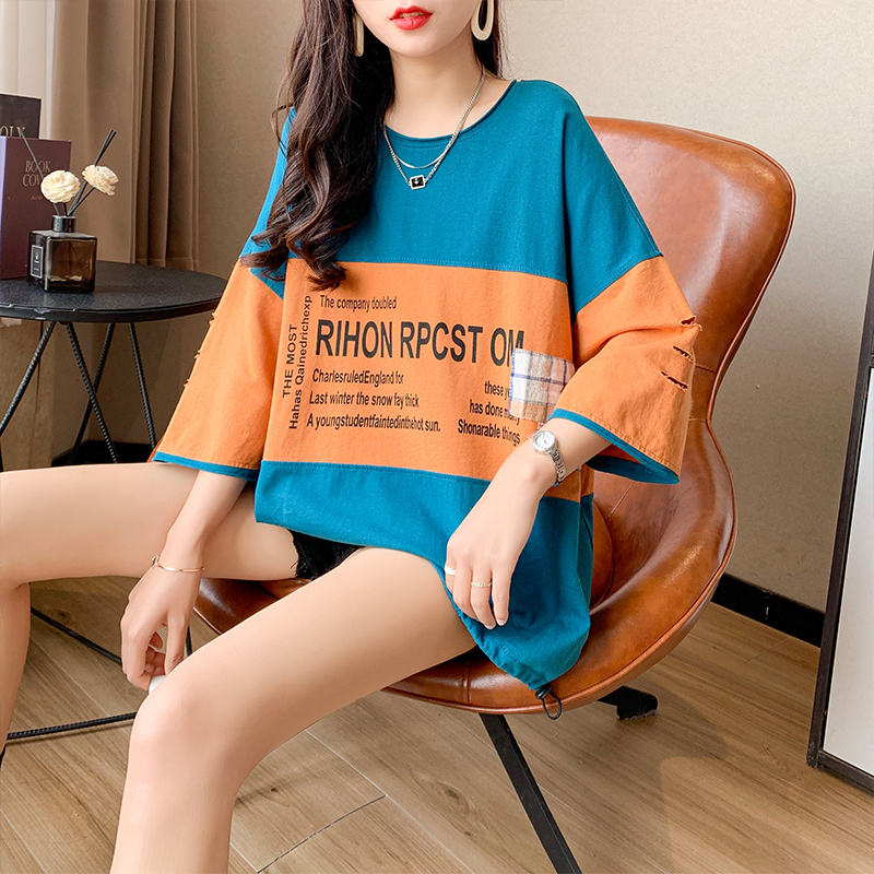Real shot 35 cotton 2022 new cartoon stitching holes fake two short sleeve T-shirts women's ins top Korean loose
