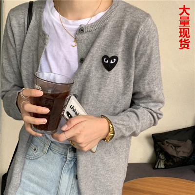 2020 spring and Autumn New Korean peach heart knitted cardigan women's long sleeve short slim bottomed sweater small coat