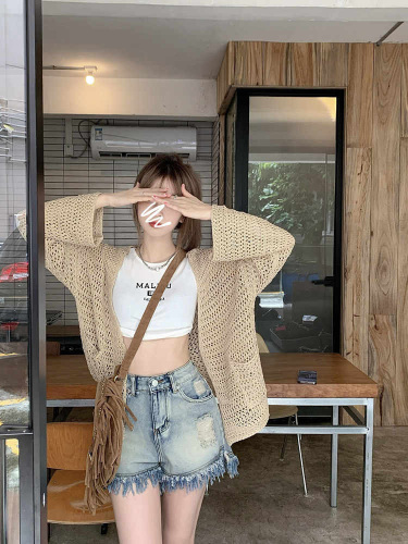 Khaki holiday style hollow out sunscreen knitted cardigan women's design sense suspender skirt with thin blouse jacket summer