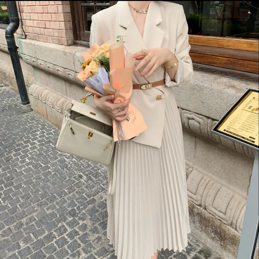 Early autumn new French temperament suit coat dress women's super fairy solid color Lapel skirt trend