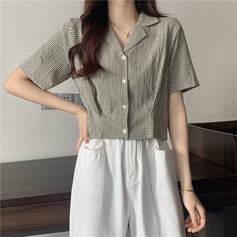 Real price ~ New Korean plaid shirt in summer, loose, irregular and versatile top