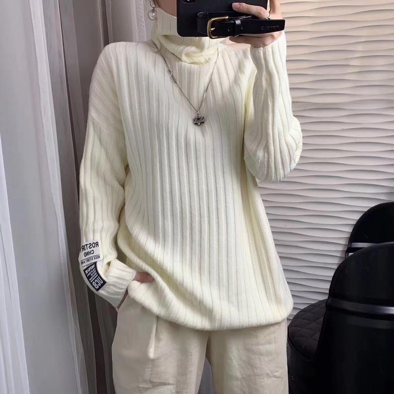 Europe station autumn / winter 2020 new vertical stripe high neck sweater women's loose and lazy Pullover solid color knitted bottoming shirt
