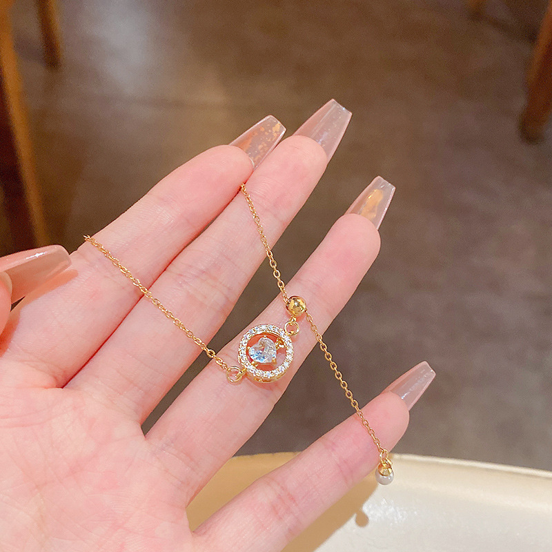 Light luxury niche high-end design sense beating heart bracelet female micro-inlaid exquisite zircon hand jewelry net red bracelet