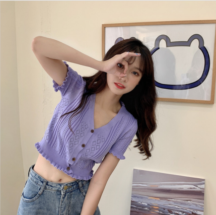 Summer 2020 new Korean women's small group design sense hollow wood ear edge V-neck single breasted short sleeve Knitted Top