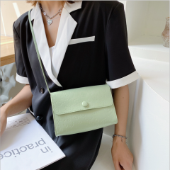 Embossed solid color temperament small bag women's new fashion, foreign style and simplicity. Today's popular one shoulder messenger small square bag