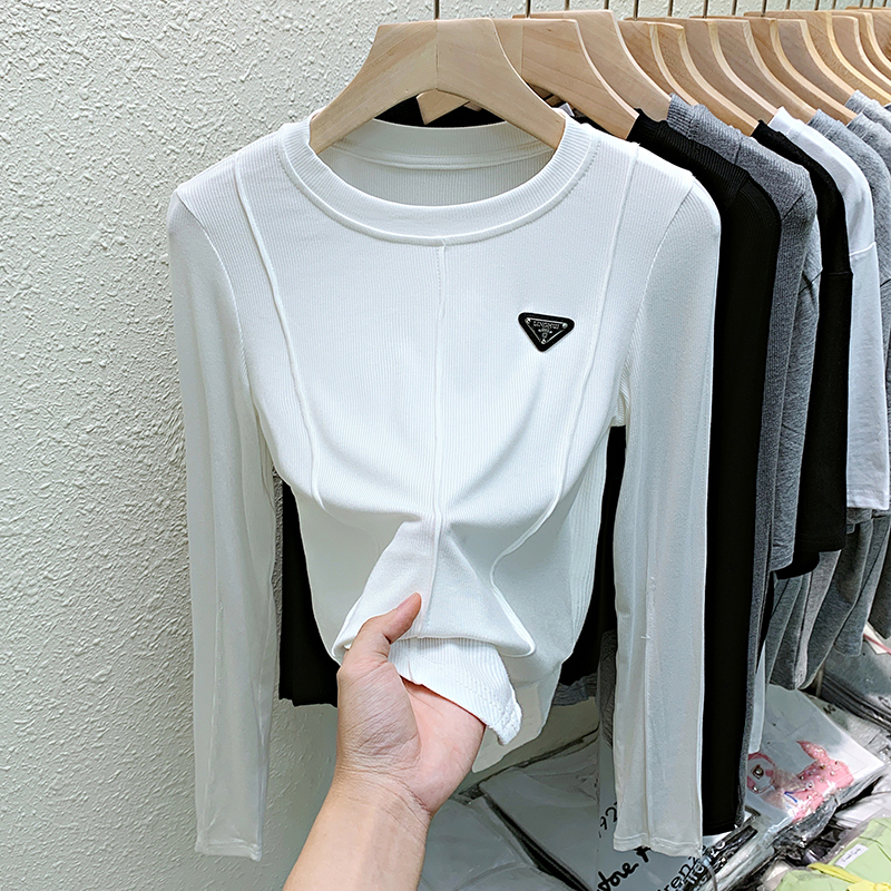 Real shot new long-sleeved t-shirt women's round neck pure cotton good amount triangle hem irregular top bottoming shirt