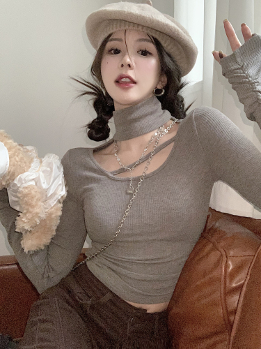 Design sense niche slim-fit knitted sweater women's autumn and winter 2022 new high-necked ladies hollow bottoming shirt top