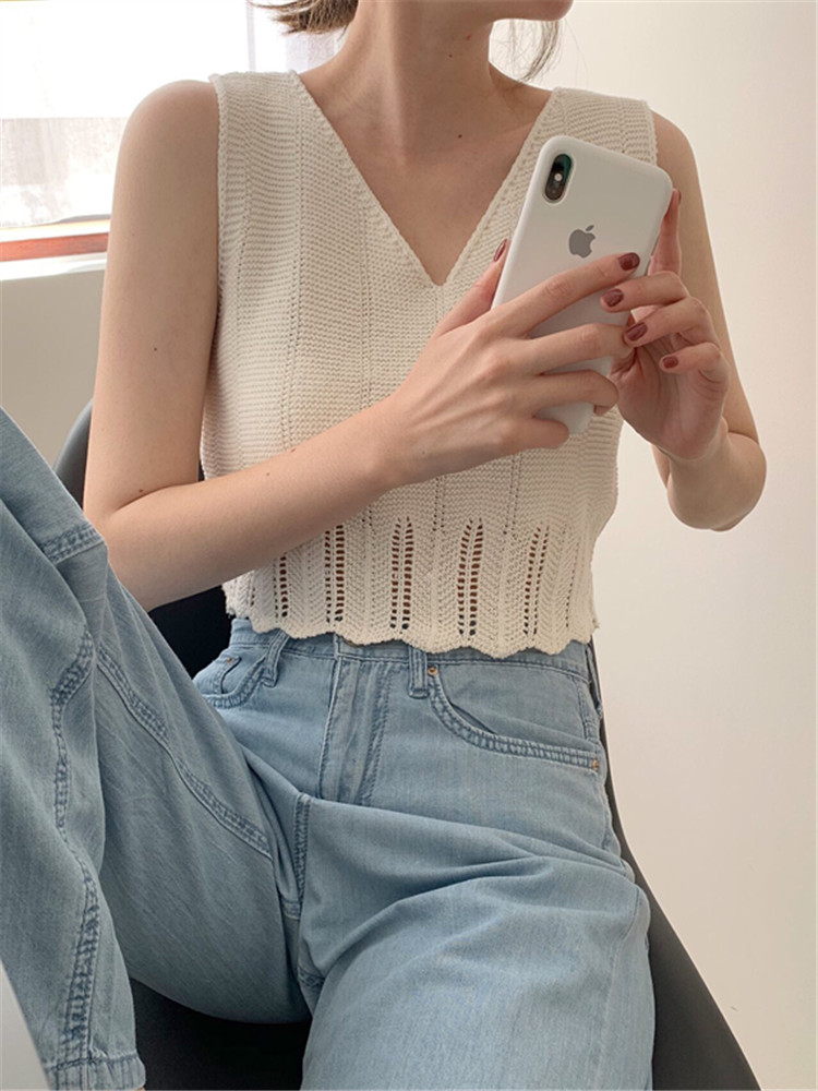 The new style in summer 2008 is chic, hollow out, with a bottomed knitted vest. Women's versatile thin unique short top