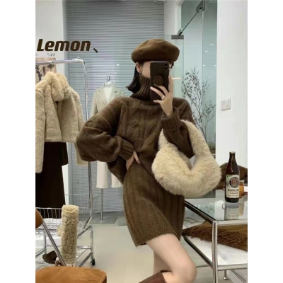 2021 autumn Korean version new high neck lazy wind twist sweater women + knitted high waist skirt