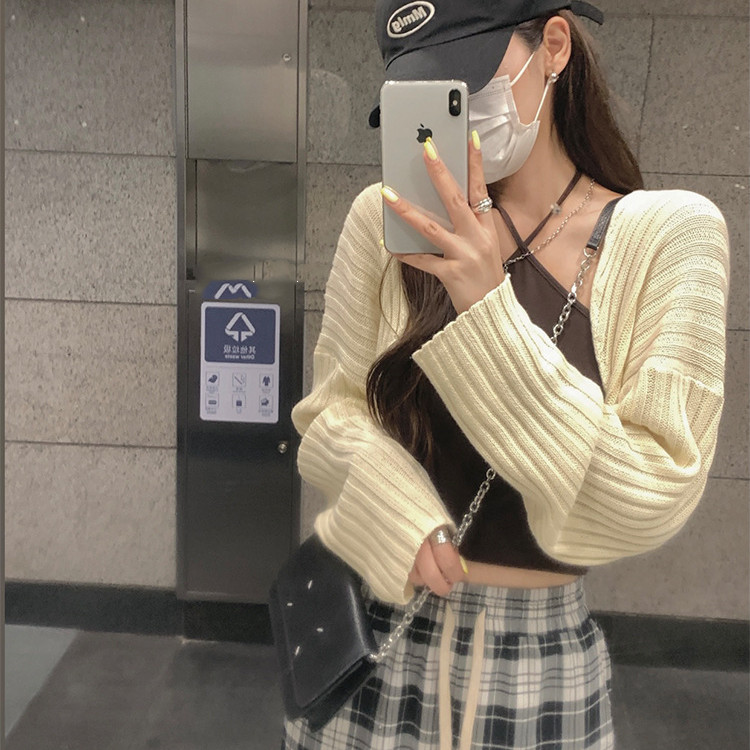 Sunscreen cardigan knitted jacket women's spring and autumn thin section niche shawl suspenders outer blouse short long-sleeved top