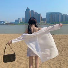 Real shot with chiffon sunscreen and beach in summer