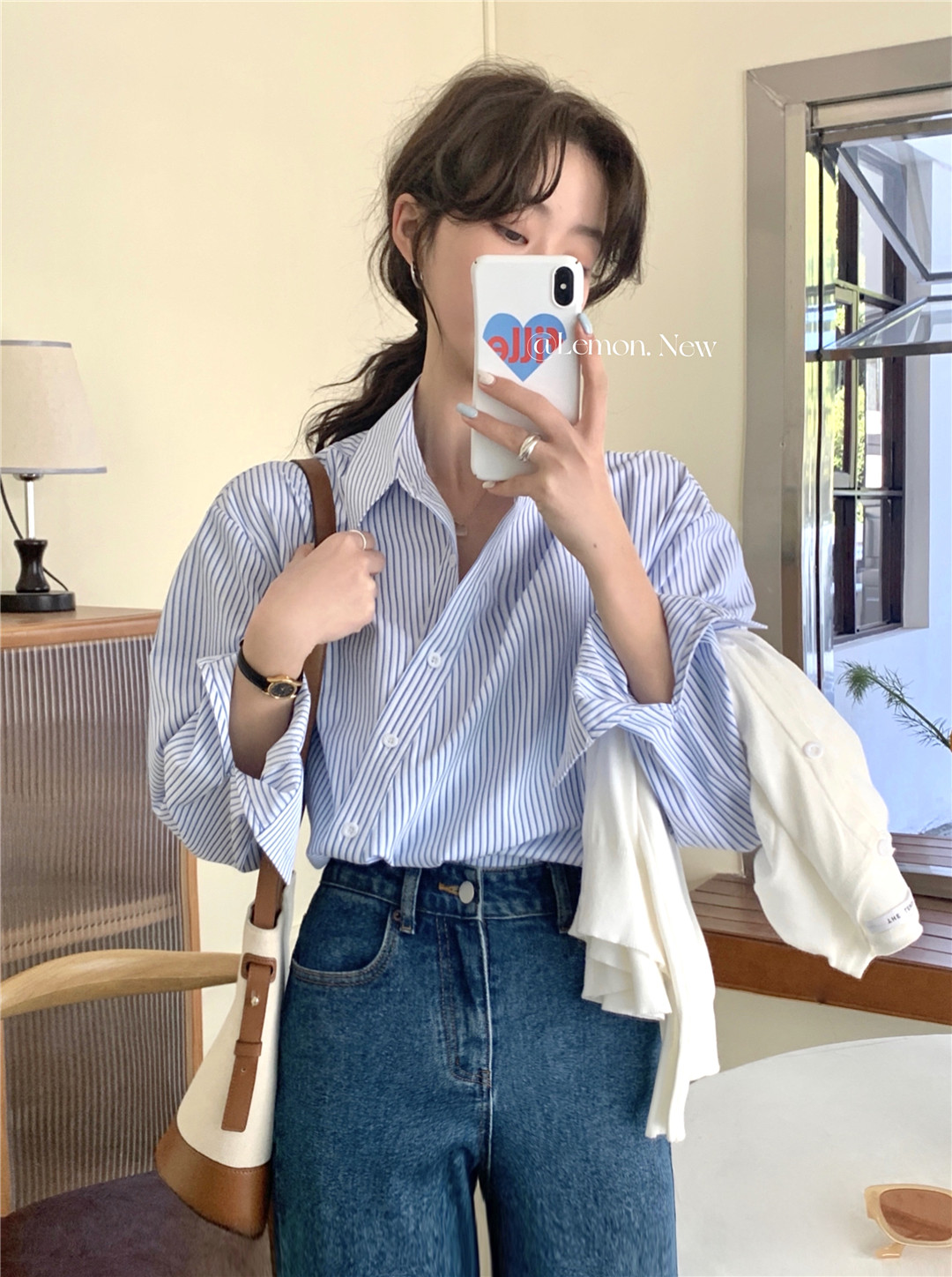 the lemon2023 early spring new design sense niche irregular oblique button striped long-sleeved shirt women