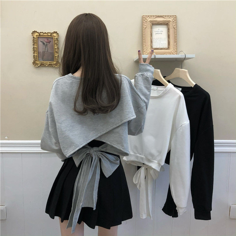 2022 spring new Korean loose short careful machine hollowed out backless bandage thin long sleeve sweater women's top