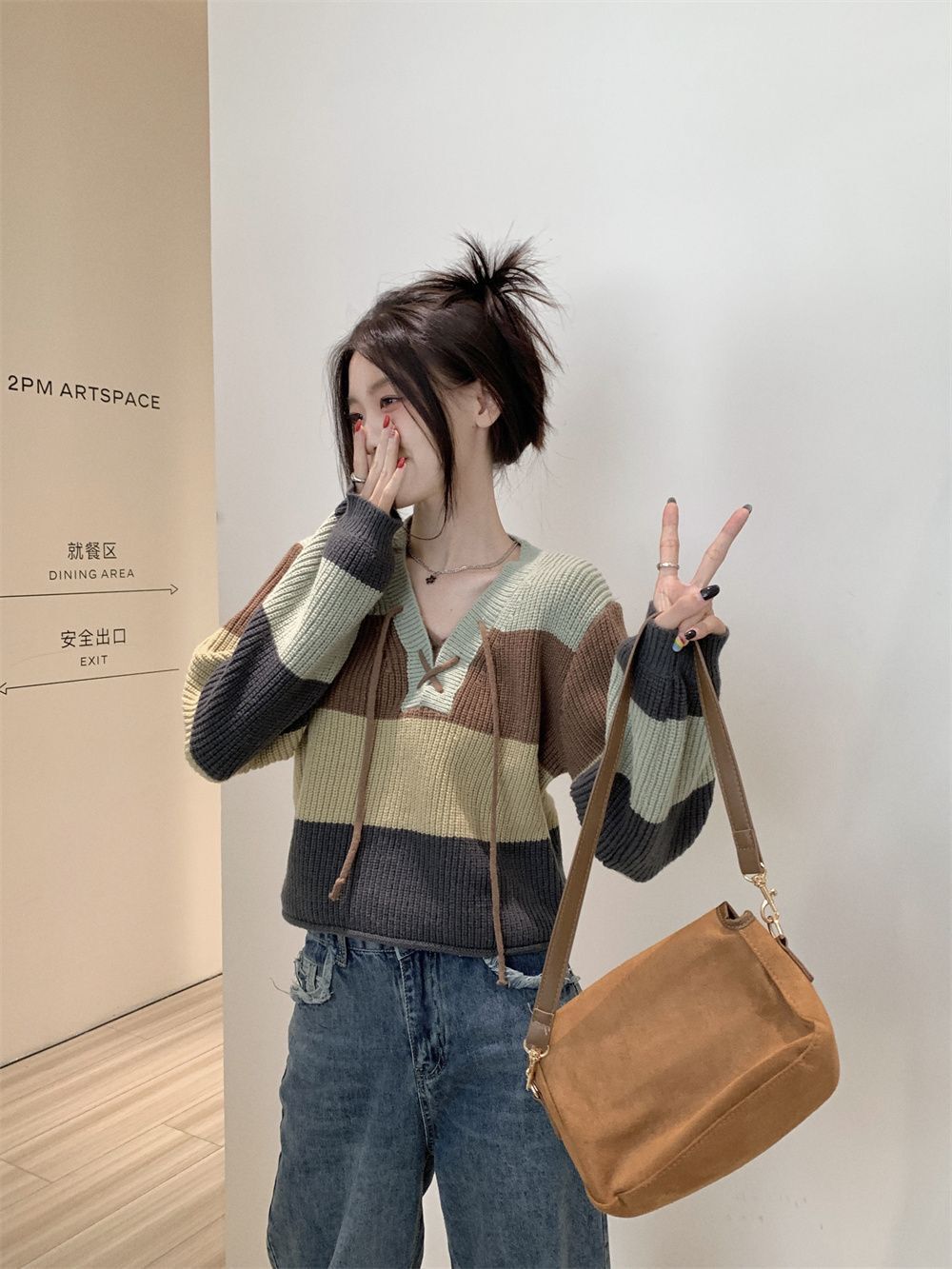 2022 autumn and winter new style lazy style striped contrasting color V-neck sweater women's top loose and slimming all-match sweater