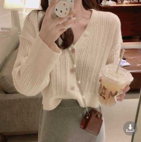 Hollow cardigan sweater women's 2021 autumn new lazy style V-neck gentle loose thin short knitted coat