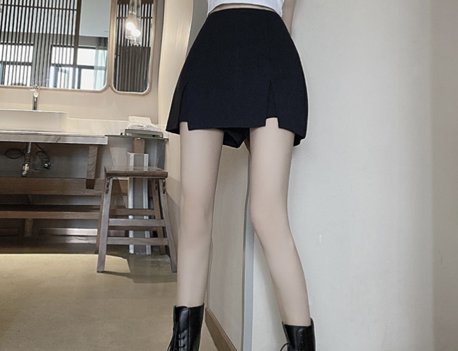 Super high waist, tight and thin A-line skirt, new irregular sexy black half suit and trouser skirt in summer, female
