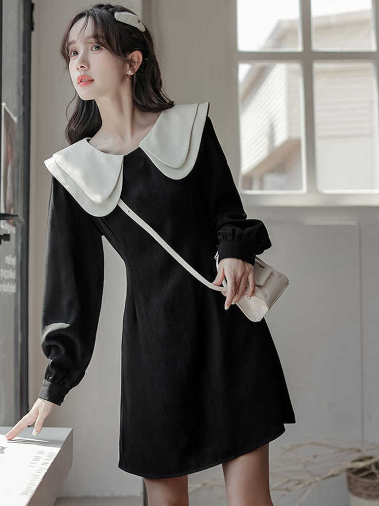 Doll collar black long-sleeved dress female autumn and winter 2022 new early autumn temperament skirt little black dress small man