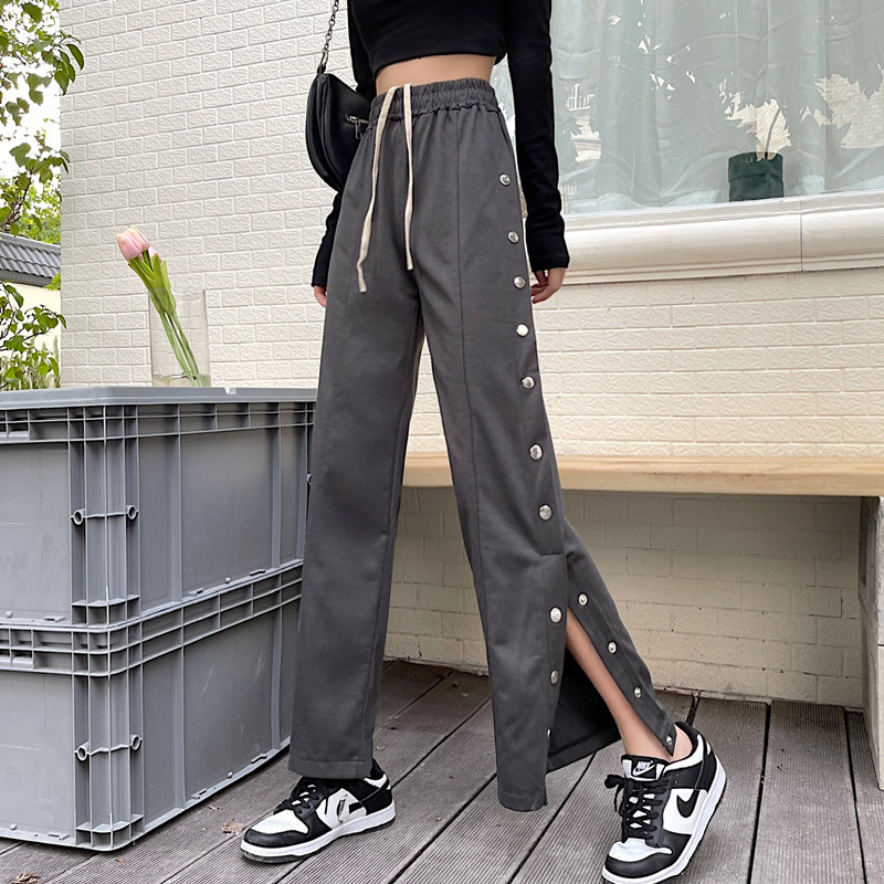 Real time casual pants female Spice Girl American sports pants street side button pants female design sense of minority high street trend