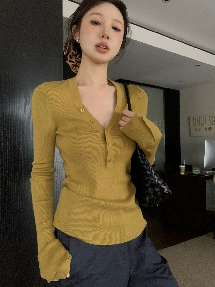 Real shot of fashionable button V-neck solid color slimming sweater basic top