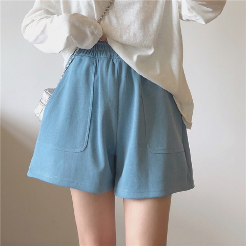 Casual solid color sports shorts women walking out of the street, high waist, thin, loose wide leg hot pants