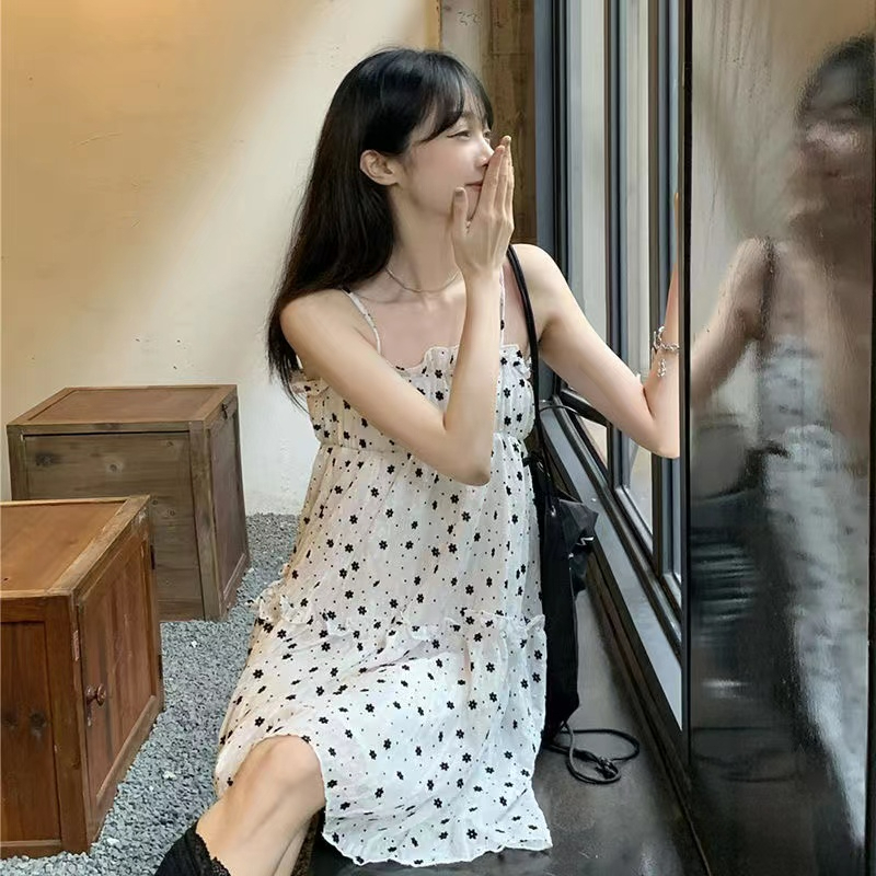 Suspender dress 2023 new summer small floral Korean version loose ins super fairy student slim skirt