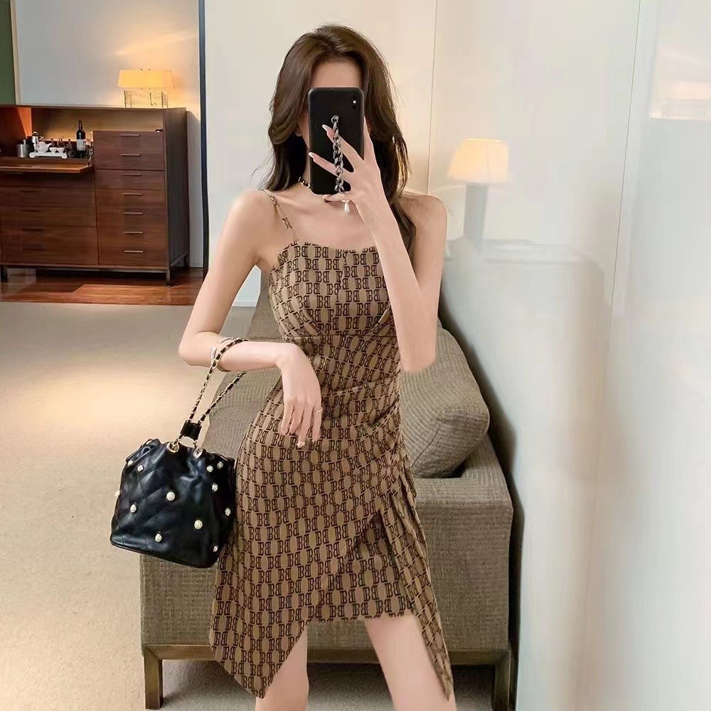 Sexy suspender dress women's 2022 summer new pure sexy hot girl fried Street irregular waist slim skirt