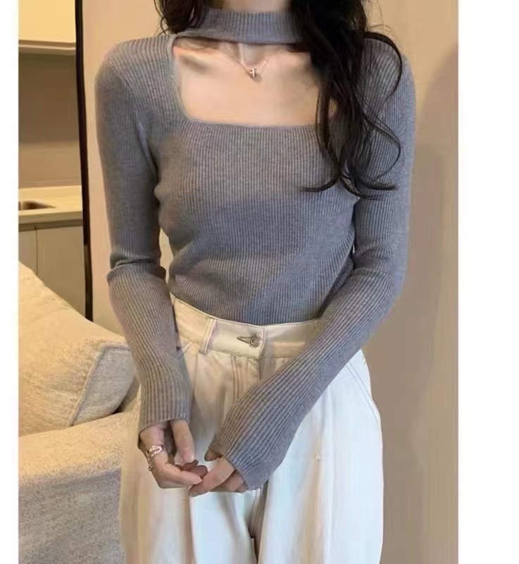 Early autumn design sense knitted vest women's outer wear long-sleeved 2022 new v-neck kink niche sweater gentle top