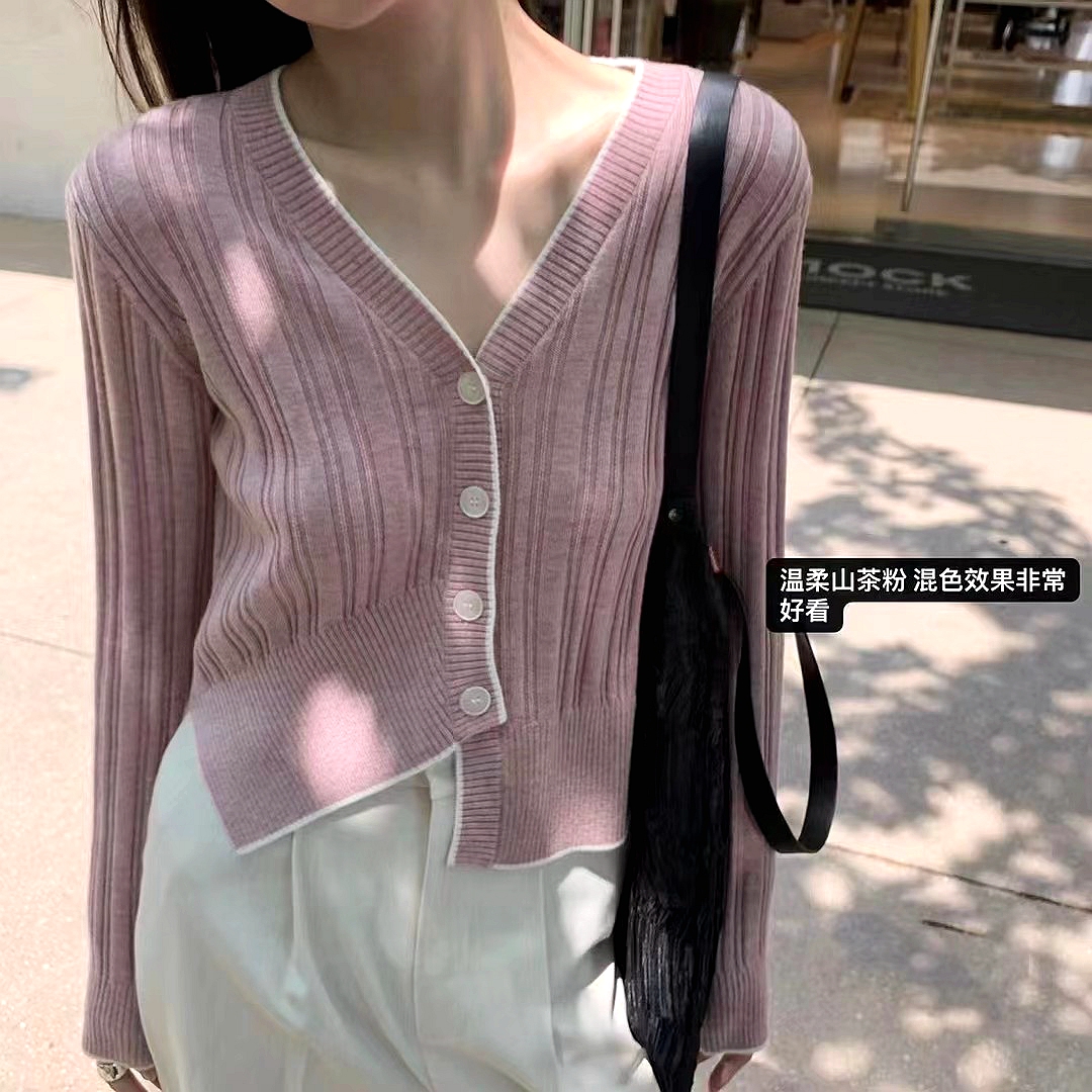 2022 early autumn new style bumped edge irregular slanted placket single wear V-neck knitted cardigan college wind top women