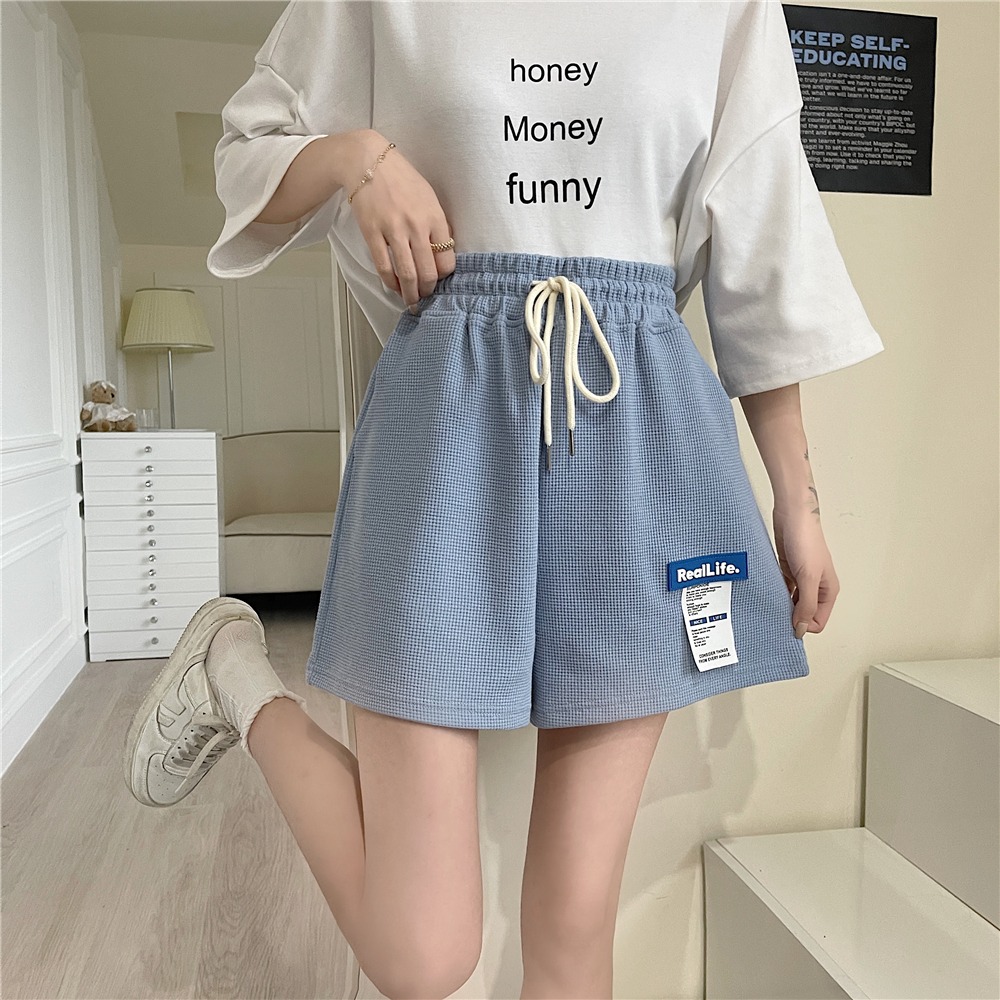 Real shot 2022 summer label waffle casual shorts women's loose and versatile elastic high waist and versatile wide leg hot pants