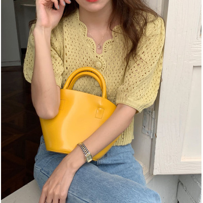 Vivis type Korea dongdamen 2022 spring and summer solid color V-neck knitted hollow out bubble sleeve sweater women