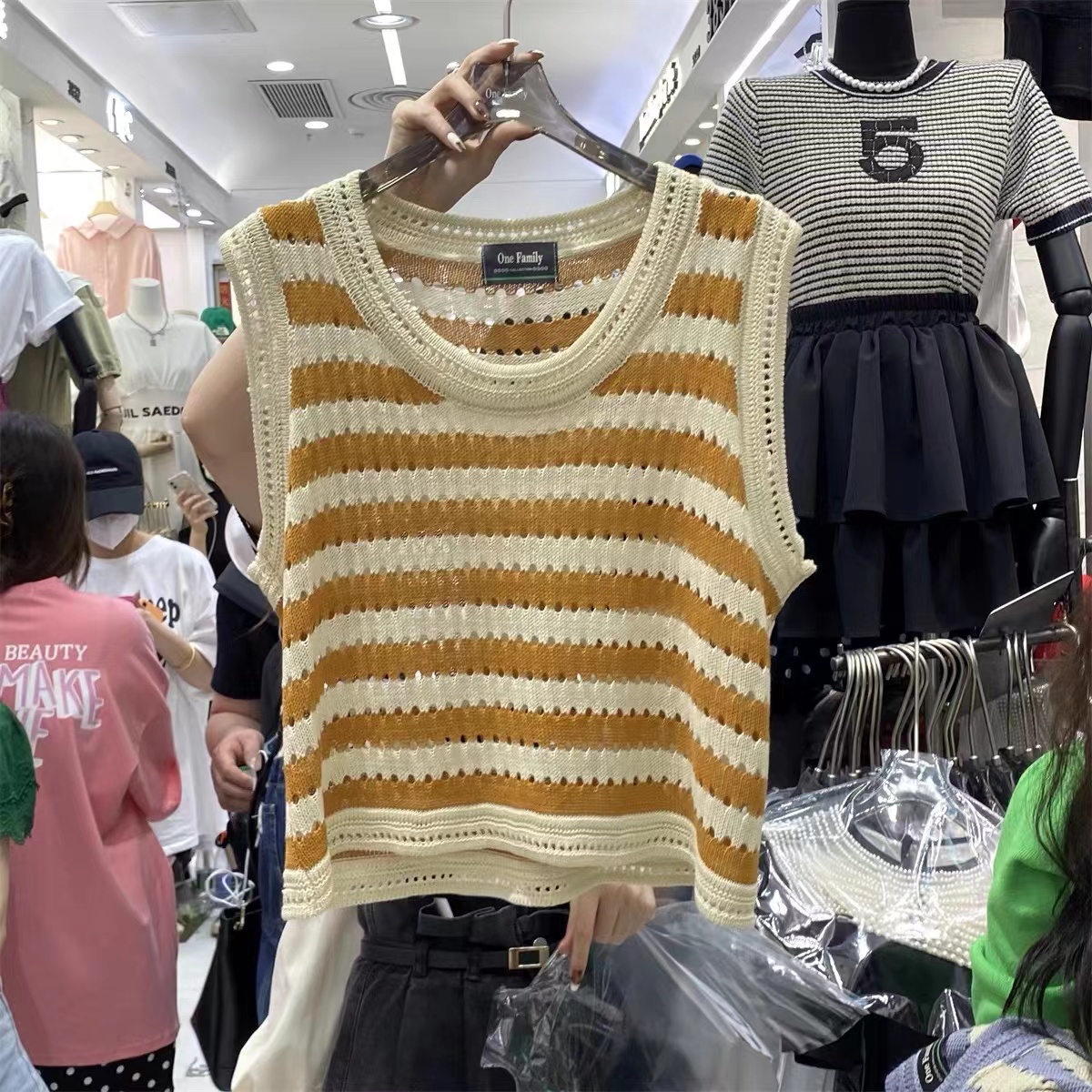 One family Korean loose design stripe hollow out sleeveless vest women's 2022 summer knitted vest