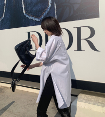 Real shot 2021 spring new BF wind dark niche design irregular shirt women's middle long Korean version top