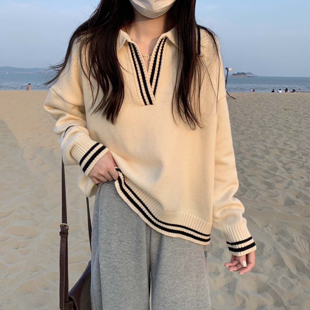 Korean style lazy style polo collar contrasting color knitted sweater women's autumn and winter design niche loose and versatile casual top
