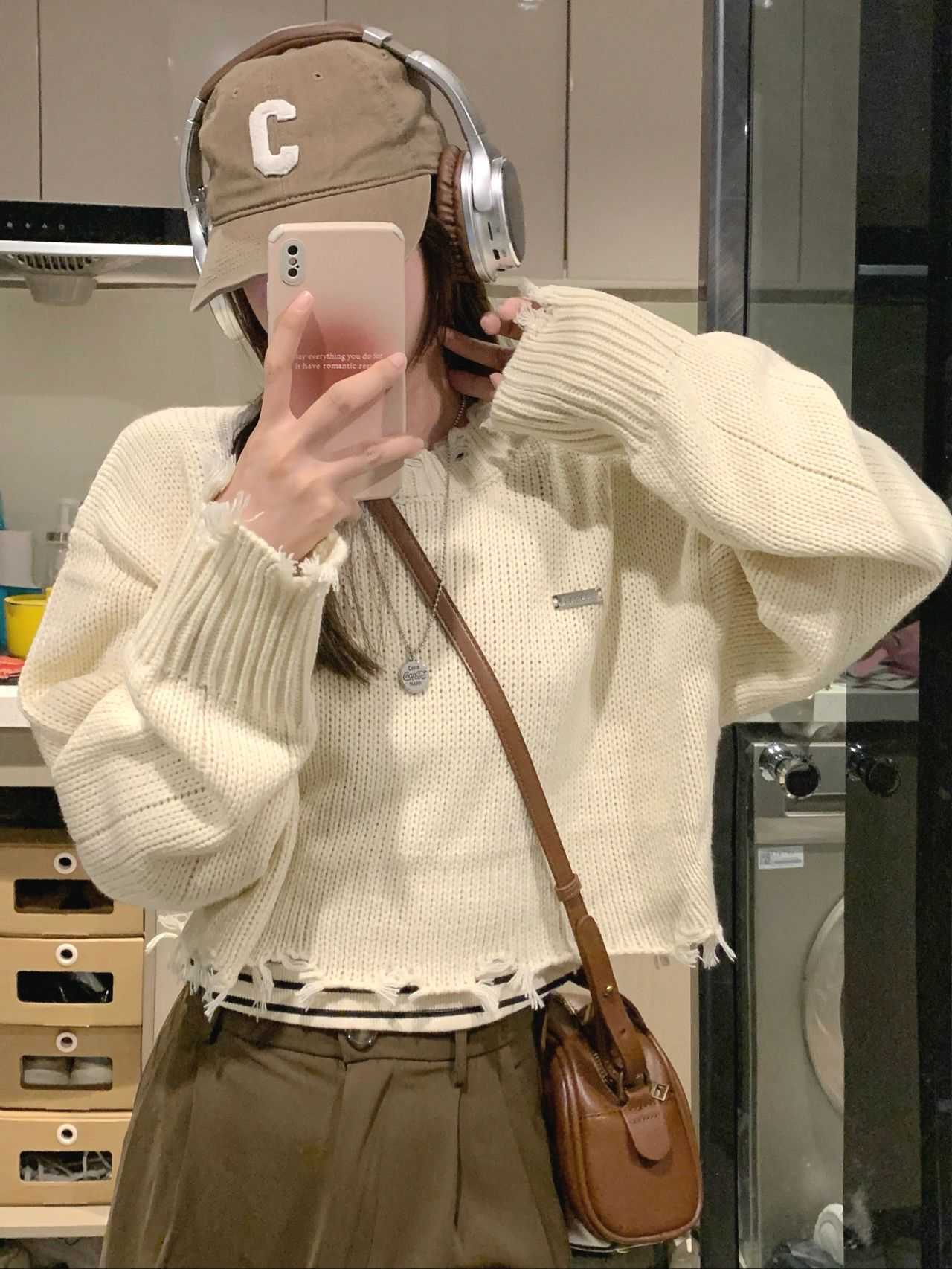 Hole short knitted sweater women's design niche loose outer wear long-sleeved top