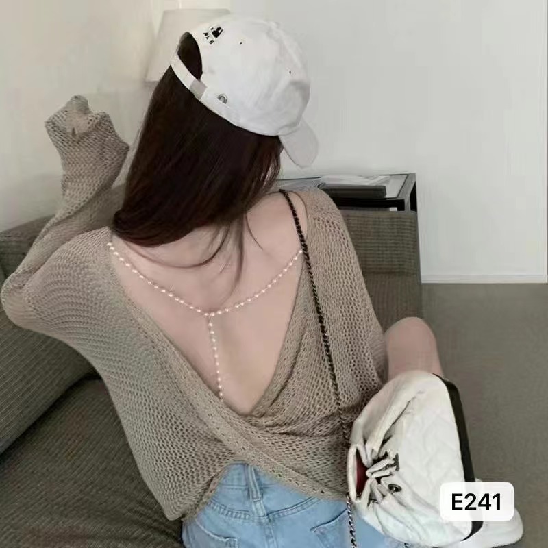 Early autumn new thick needle knitted mesh hollowed out blouse with sexy knotting pearl decorative backless shirt trend