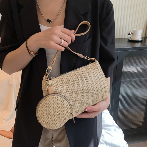 Spring new straw bag female  Korean version one shoulder armpit bag foreign style change pendant beach portable small square bag