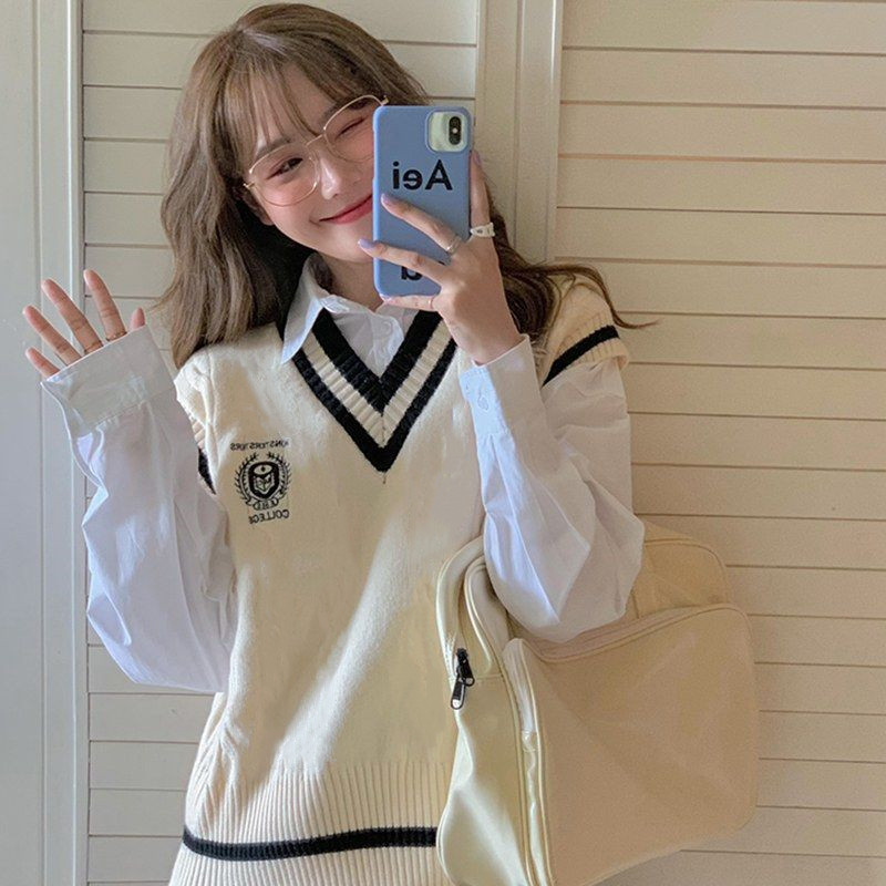 ins Korean version of the hot girl careful machine autumn contrast color design long-sleeved slim lapel off-the-shoulder smocked dress female