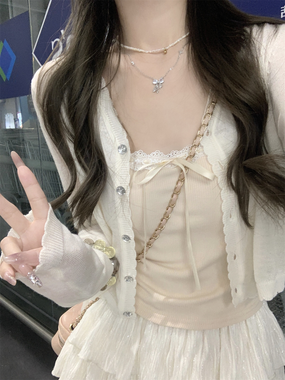 Actual shot of summer Korean style loose temperament single-row diamond button 6 wool thin sunscreen air-conditioned sweater knitted top
