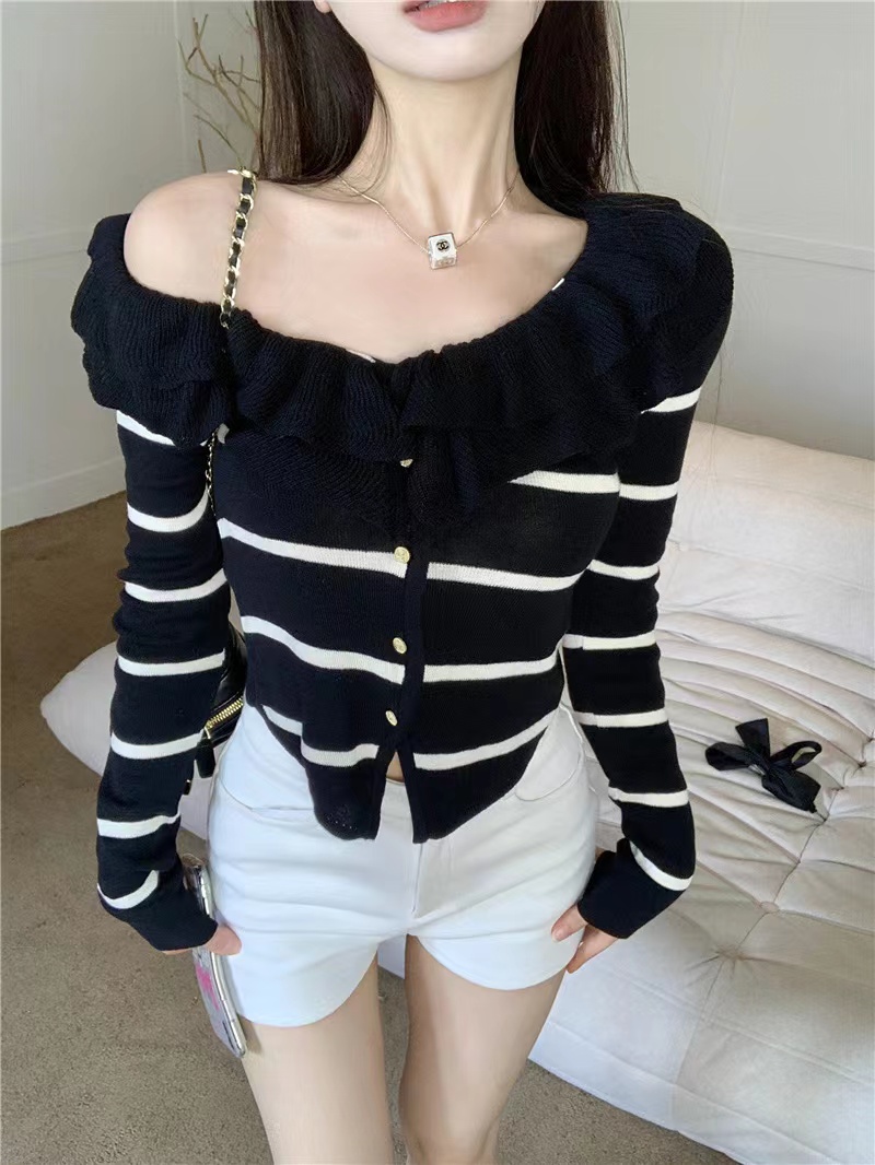 Solid color lotus leaf collar black long sleeve sleeve slim thin stitching early autumn design sense sweater female
